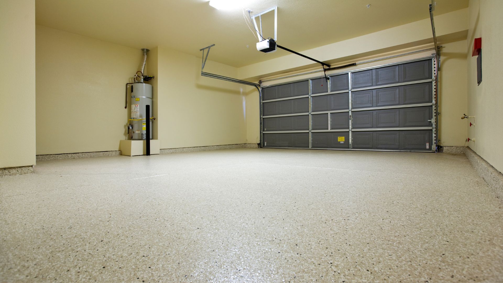 An empty garage with a fire hydrant in it