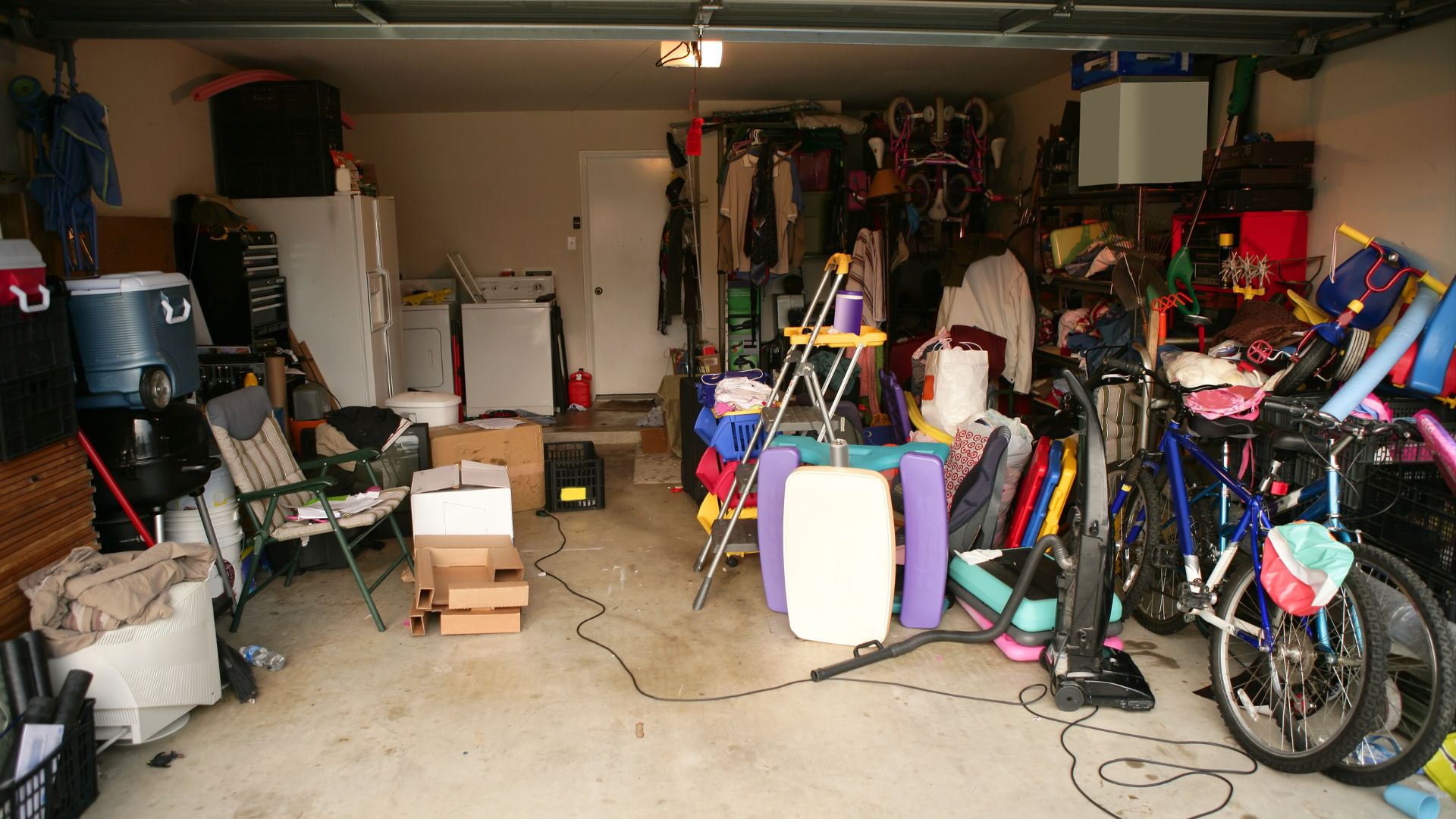 A garage filled with lots of different types of items